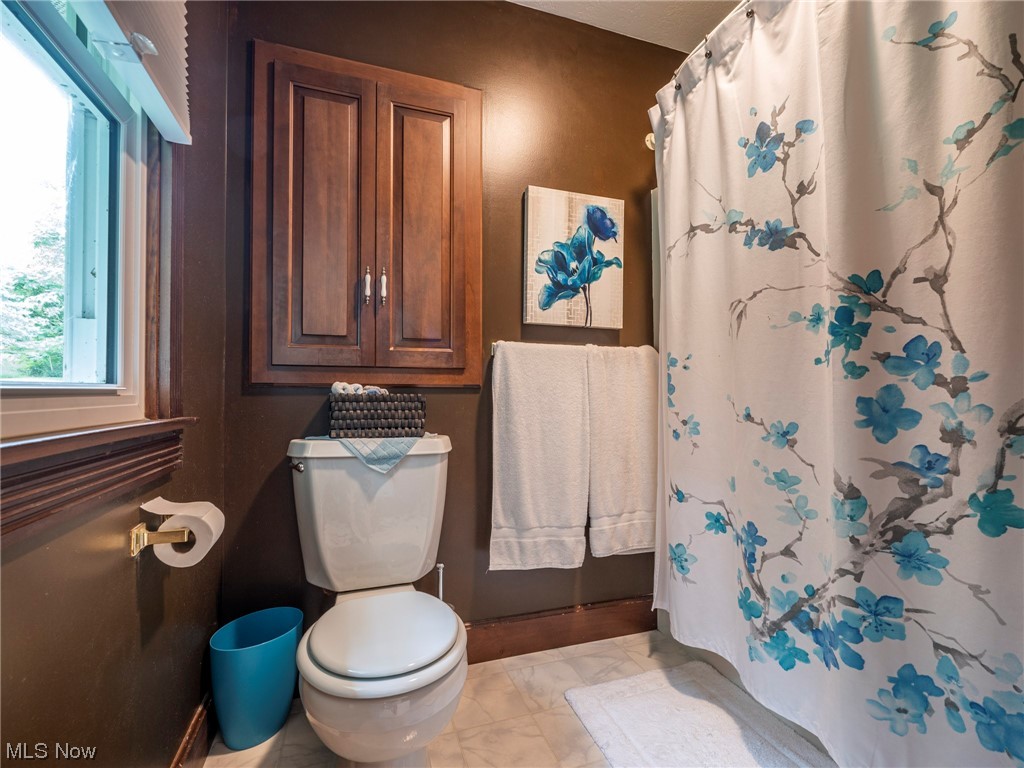 9452 Pleasant Hill Road Northwest Dundee, OH 44624 - Photo 19 of 35 Bathroom featuring light tile flooring