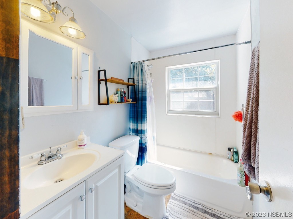 2761 Evergreen Drive Edgewater, FL 32141 - Photo 30 of 61 a bathroom with a sink toilet and shower