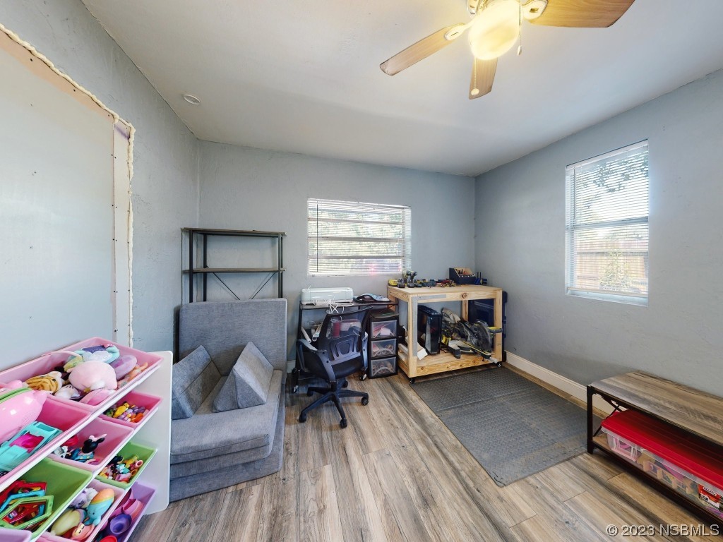 2761 Evergreen Drive Edgewater, FL 32141 - Photo 41 of 61 a bedroom with furniture and a window