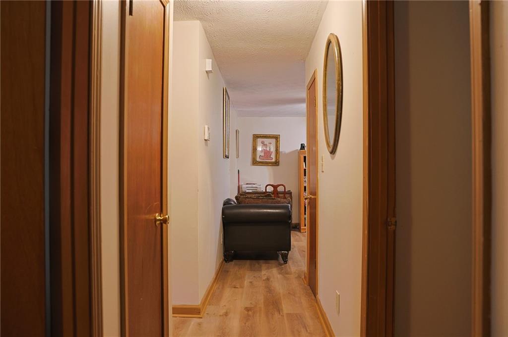 179 College Street Luthersville, GA 30251 - Photo 11 of 26 a view of a bedroom from a hallway