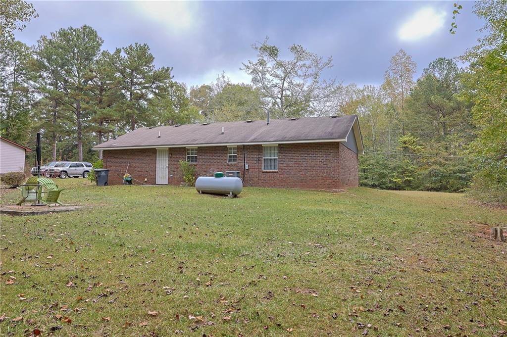 179 College Street Luthersville, GA 30251 - Photo 22 of 26 a house view with a garden space