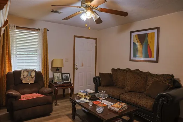 a living room with furniture and a window
