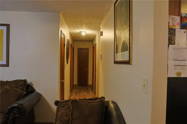 a view of hallway with windows