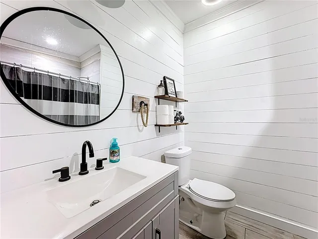 a view of wooden floor in a bathroom