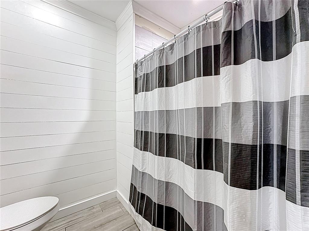 18604 Belvedere Road Orlando, FL 32820 - Photo 36 of 50 a view of wooden floor in a bathroom