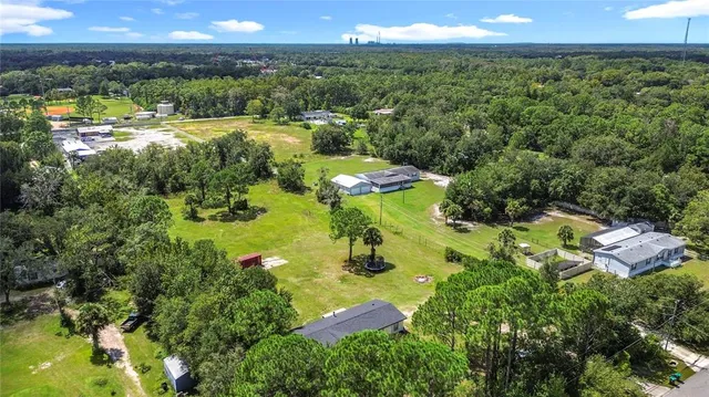 a view of a lake with a yard