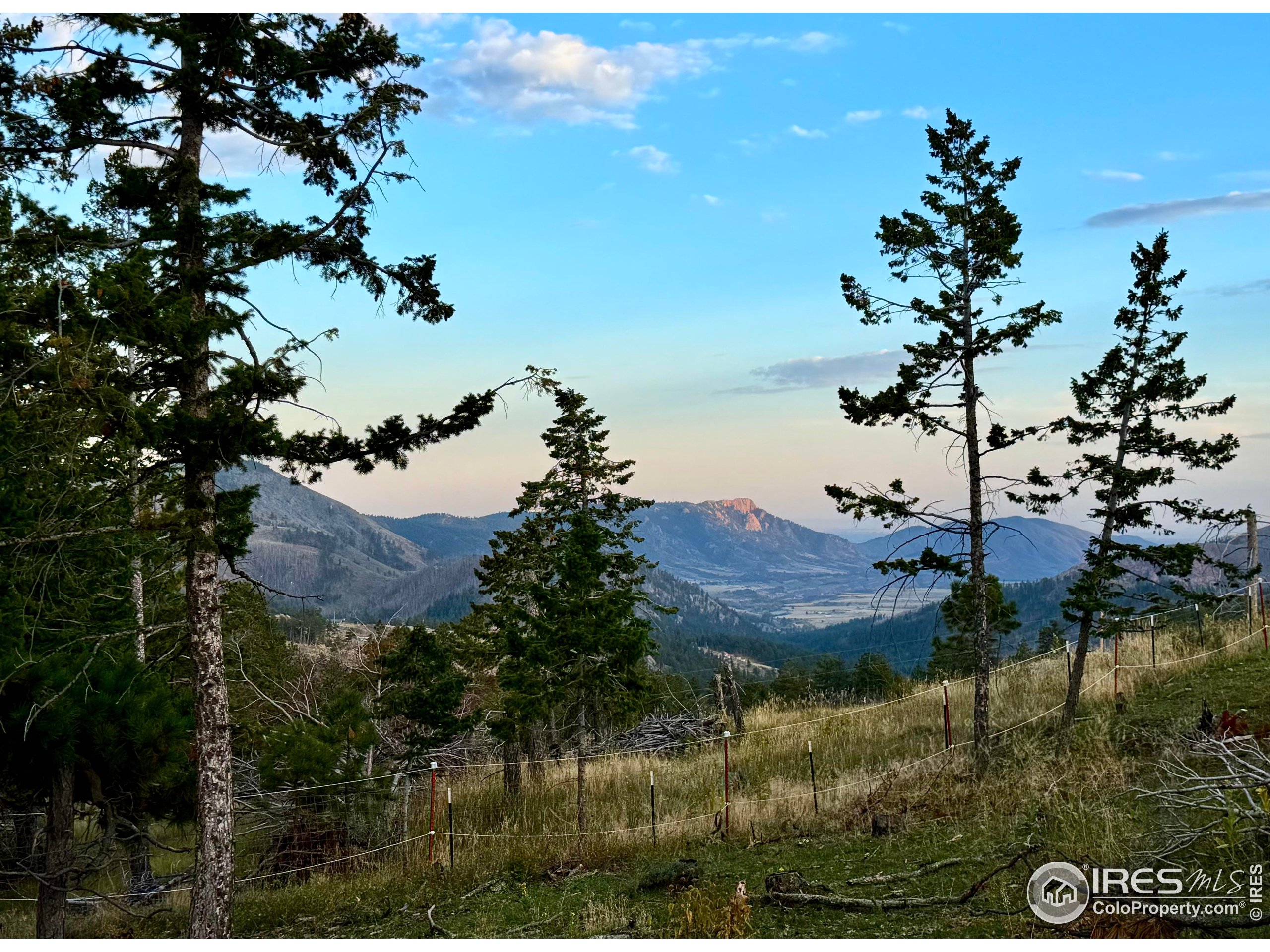 3235 Davis Ranch Road Bellvue, CO 80512 - Photo 23 of 38 a view of a lake