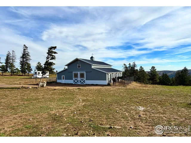 a view of a backyard of the house