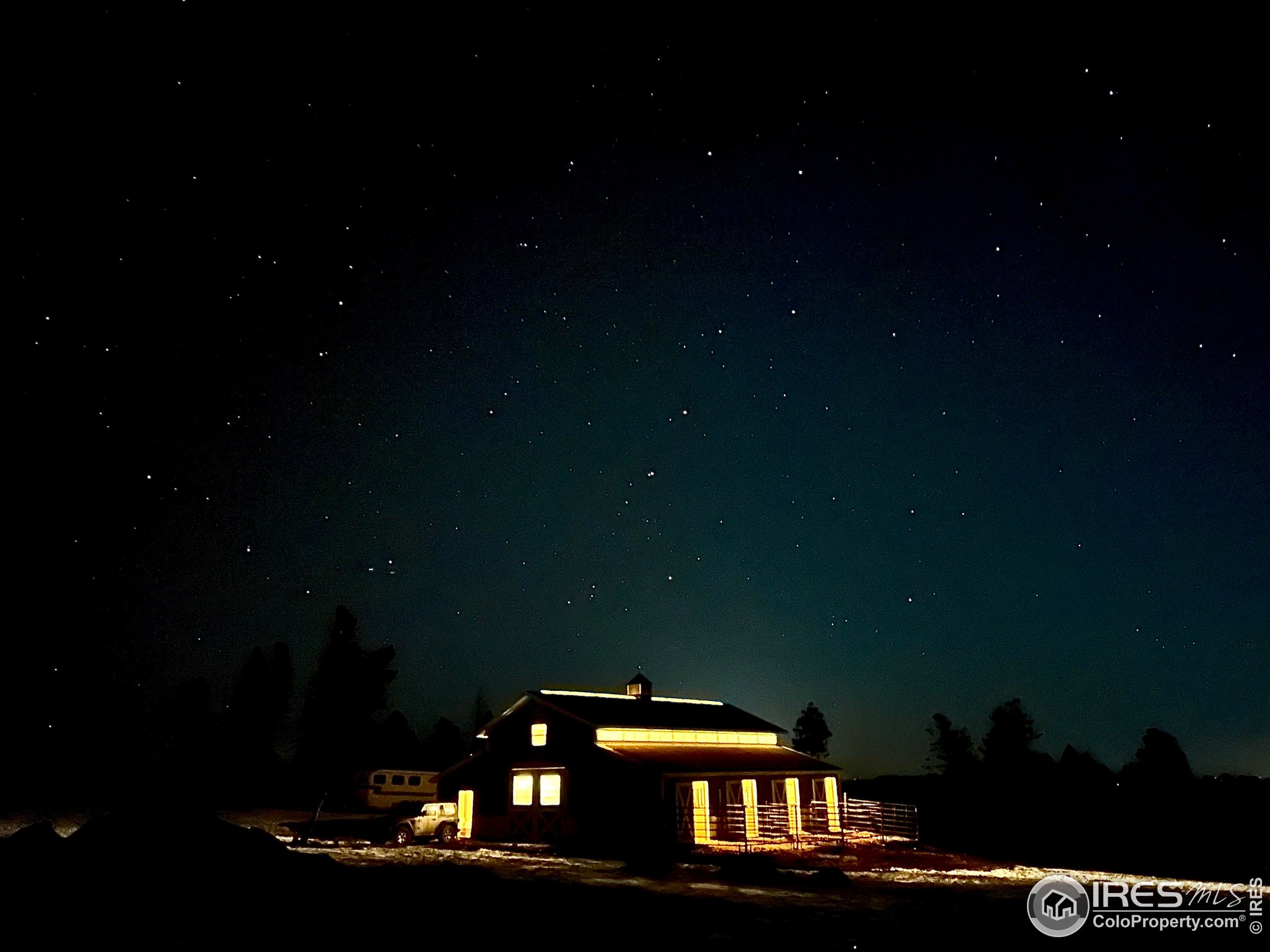 3235 Davis Ranch Road Bellvue, CO 80512 - Photo 37 of 38 a sunset view
