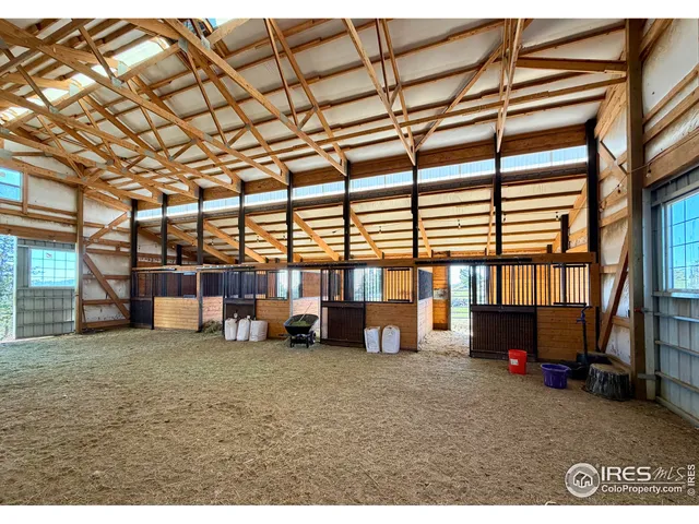 a view of a house with a snow in the yard