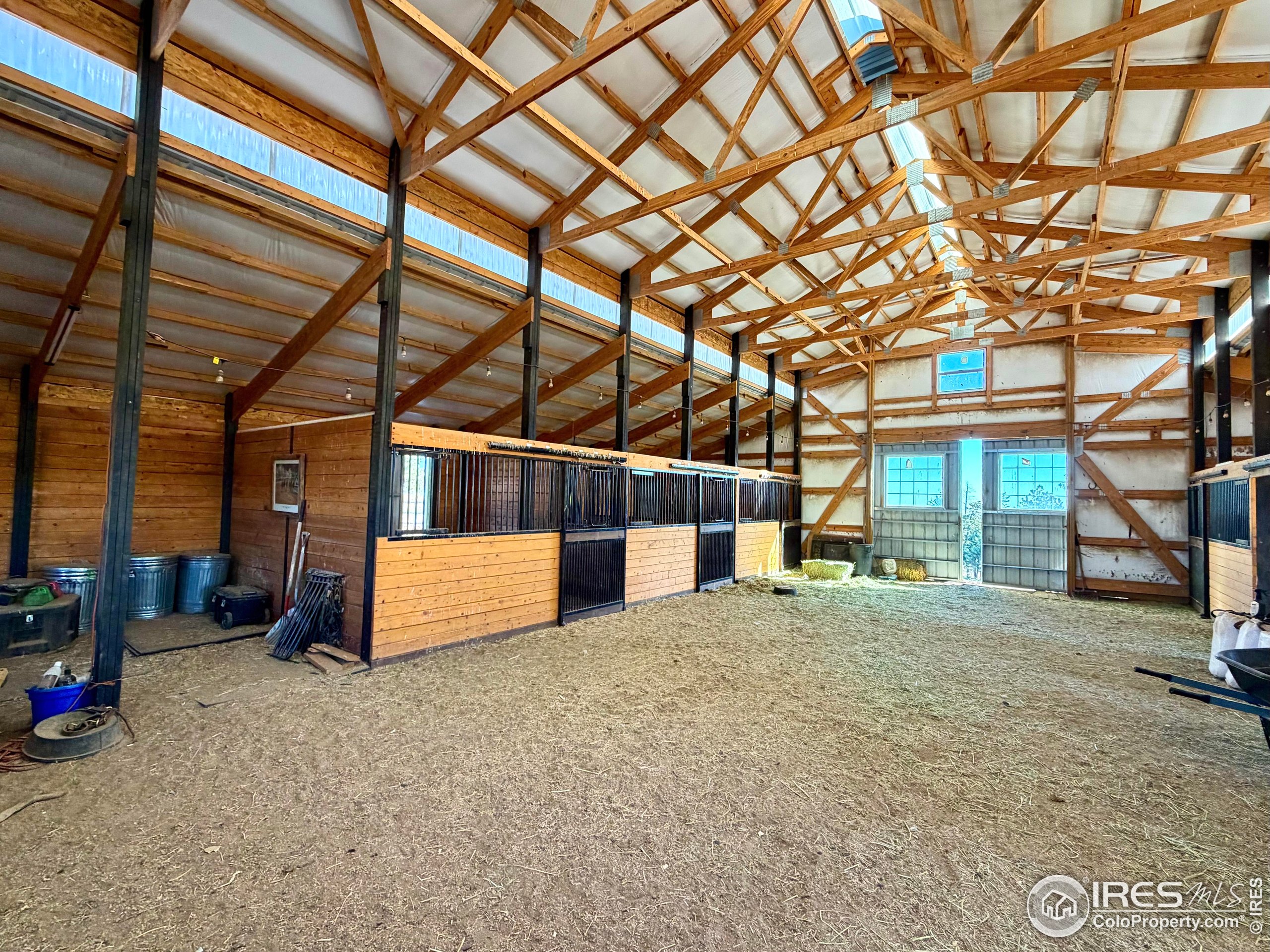 3235 Davis Ranch Road Bellvue, CO 80512 - Photo 8 of 38 a view of a house with a snow in the yard
