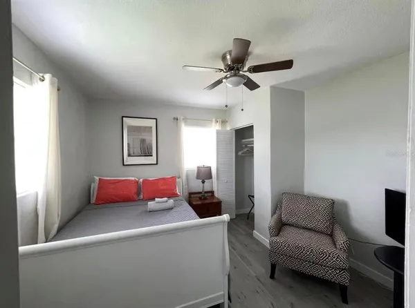 a living room with furniture and a window