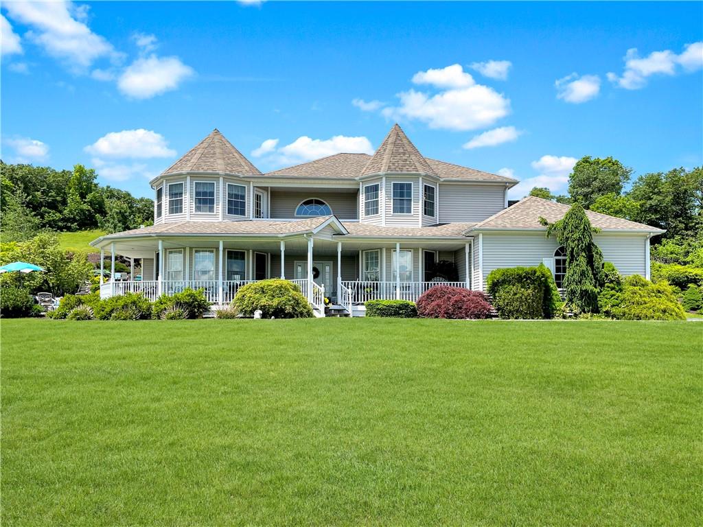 77 Eagle Crest Road Port Jervis, NY 12771 - Photo 1 of 1 a front view of a house with a garden