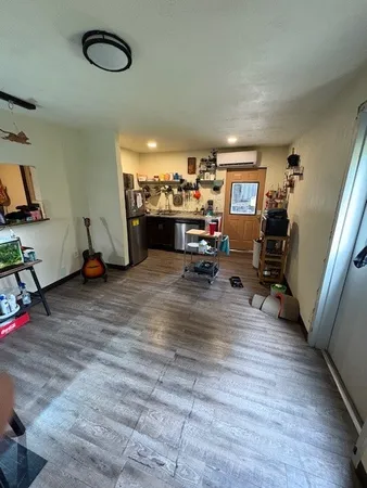 a bedroom with bed and window