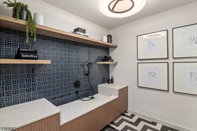 a bathroom with a sink toilet and tub