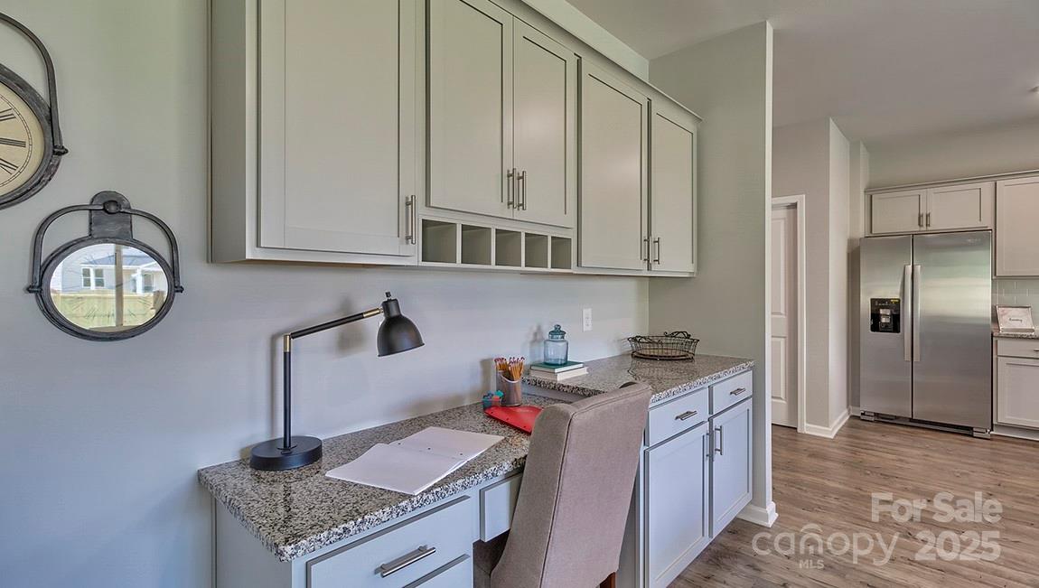 4025 Cramer Estates Gastonia, NC 28056 - Photo 14 of 36 a kitchen with stainless steel appliances granite countertop a sink dishwasher stove and cabinets