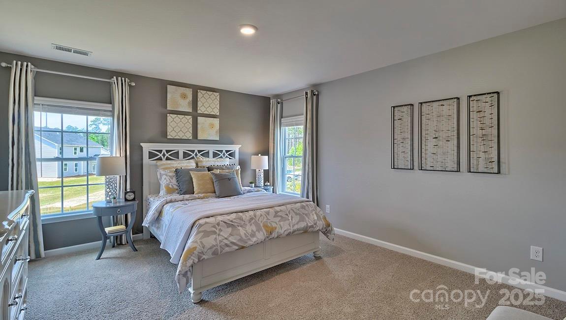 4025 Cramer Estates Gastonia, NC 28056 - Photo 33 of 36 a bedroom with a bed and a window