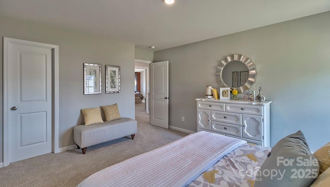 4025 Cramer Estates Gastonia, NC 28056 - Photo 34 of 36 a bedroom with furniture and a dresser