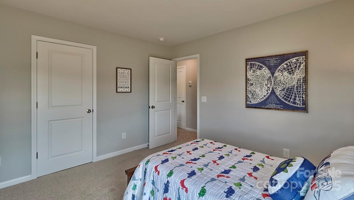 4025 Cramer Estates Gastonia, NC 28056 - Photo 36 of 36 a bedroom with a bed and a window