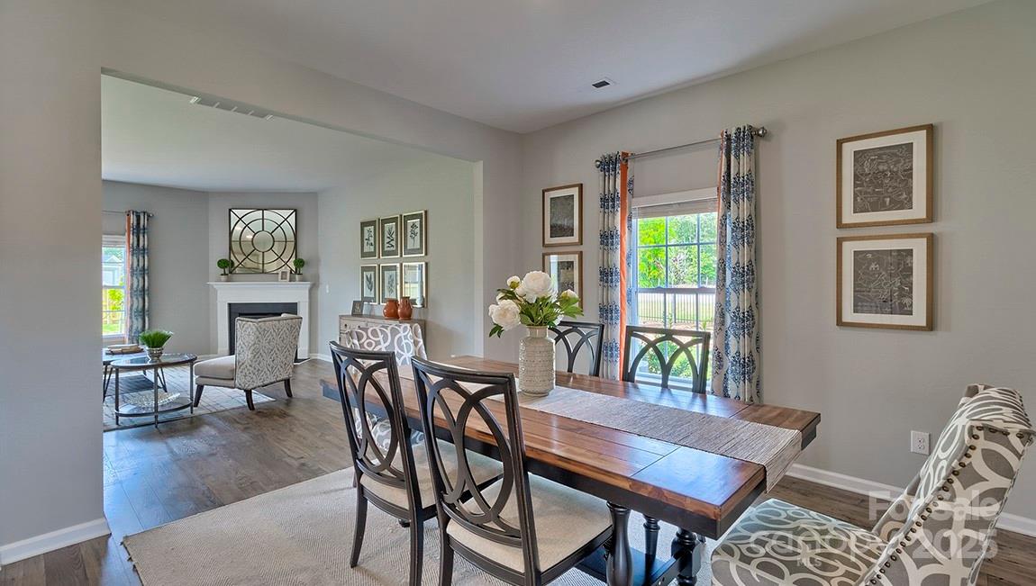 4025 Cramer Estates Gastonia, NC 28056 - Photo 4 of 36 a dining room with furniture and wooden floor
