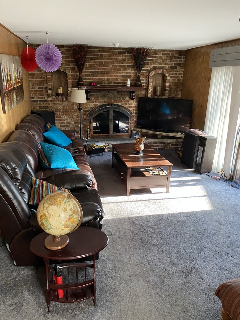 100 Michigan City Road Calumet City, IL 60409 - Photo 12 of 12 a living room with furniture pool table and flat screen tv