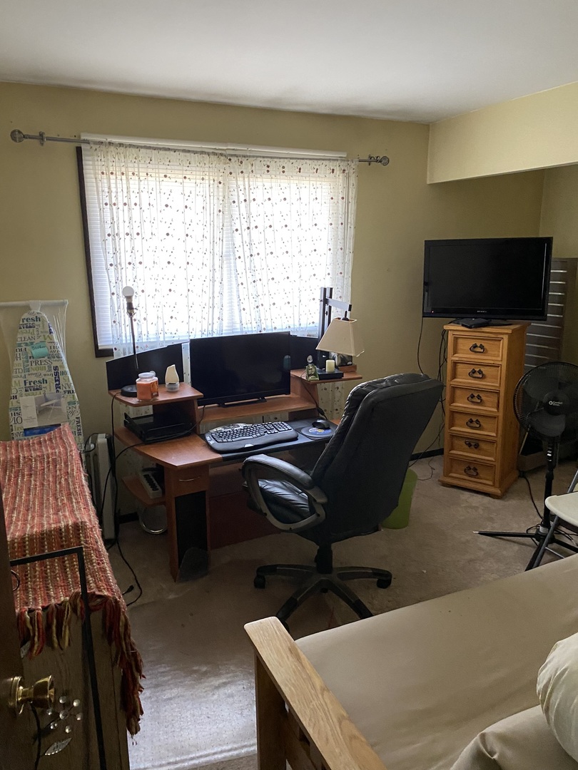 100 Michigan City Road Calumet City, IL 60409 - Photo 6 of 12 a view of a workspace with furniture and a window