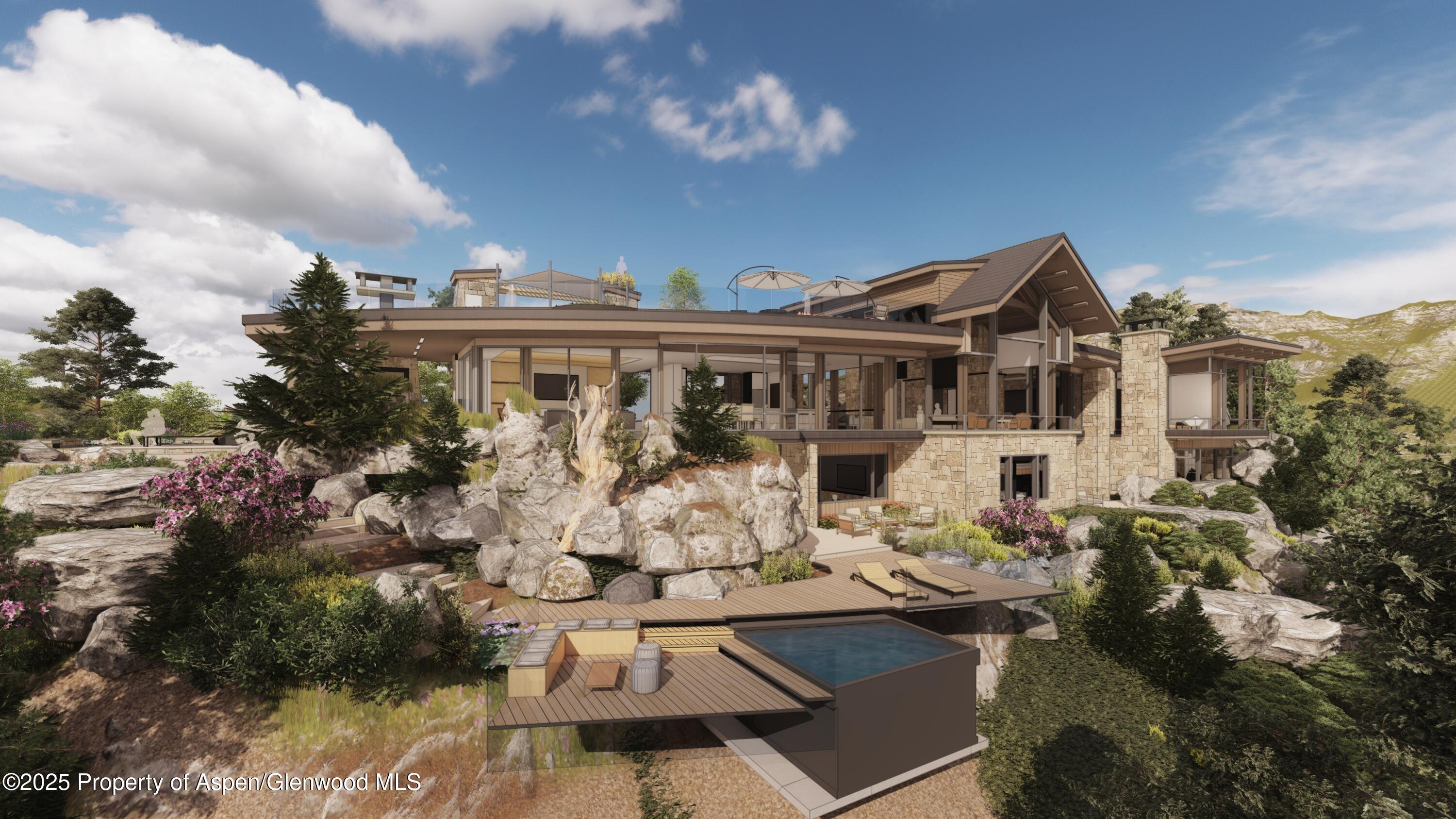 303 High Meadow Drive Dillon, CO 80435 - Photo 9 of 13 a view of a blue house with swimming pool and sitting area