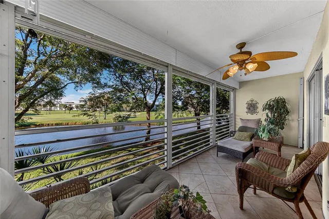 a view of two chairs in a patio