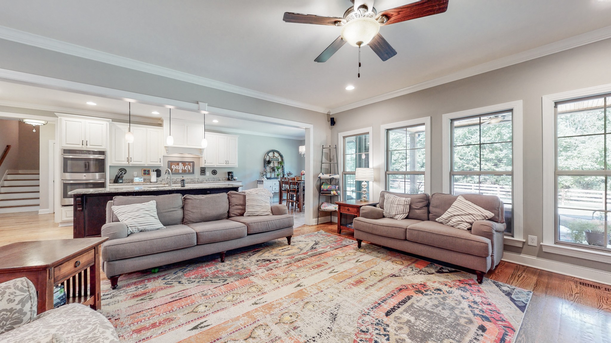 7270 Old Franklin Road Fairview, TN 37062 - Photo 12 of 46 a living room with furniture and a large window