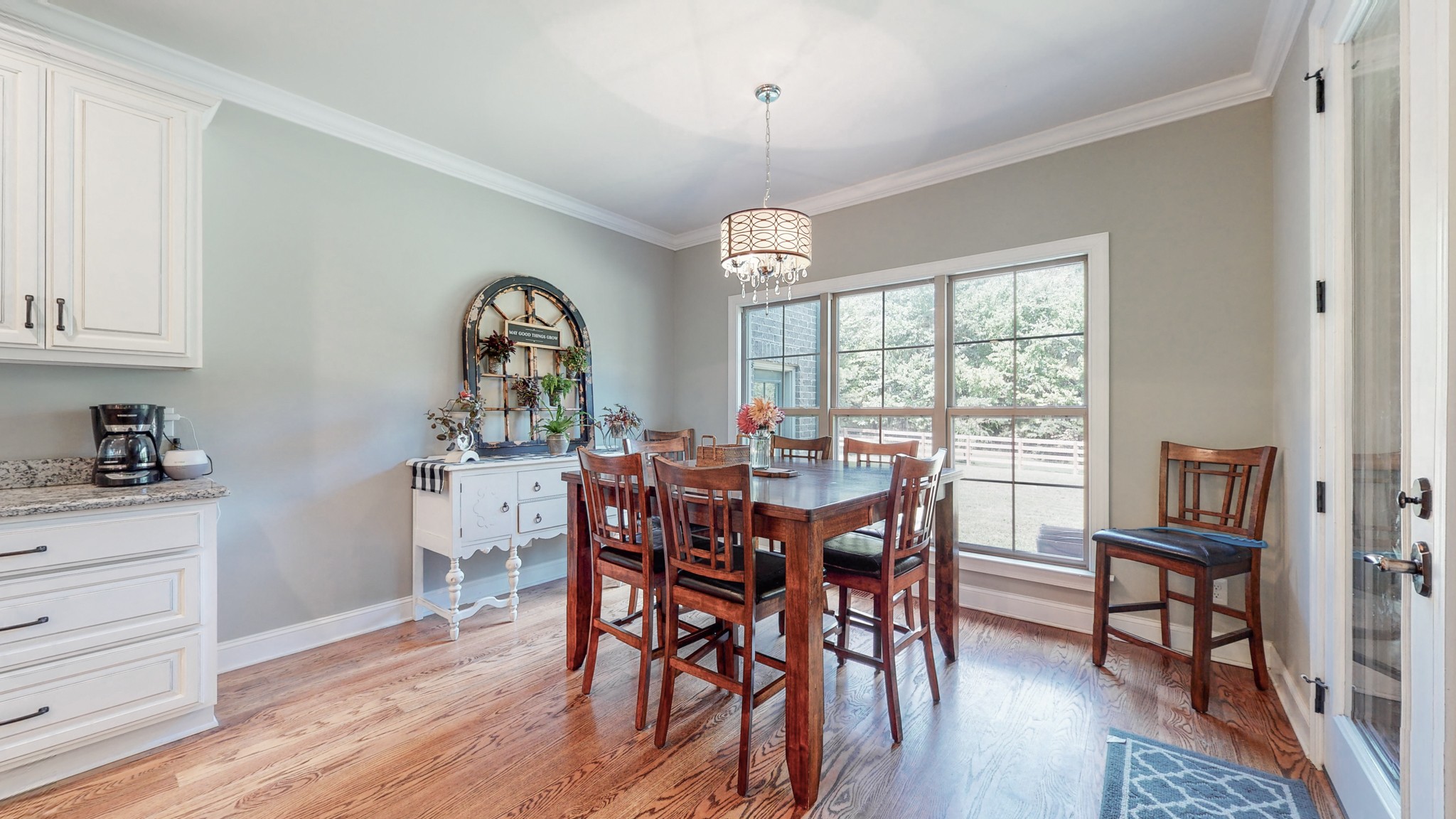 7270 Old Franklin Road Fairview, TN 37062 - Photo 21 of 46 a view of a dining room with furniture window and wooden floor