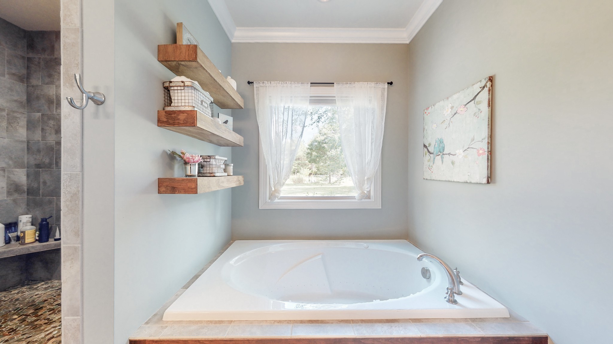 7270 Old Franklin Road Fairview, TN 37062 - Photo 25 of 46 a bathroom with a tub and a window