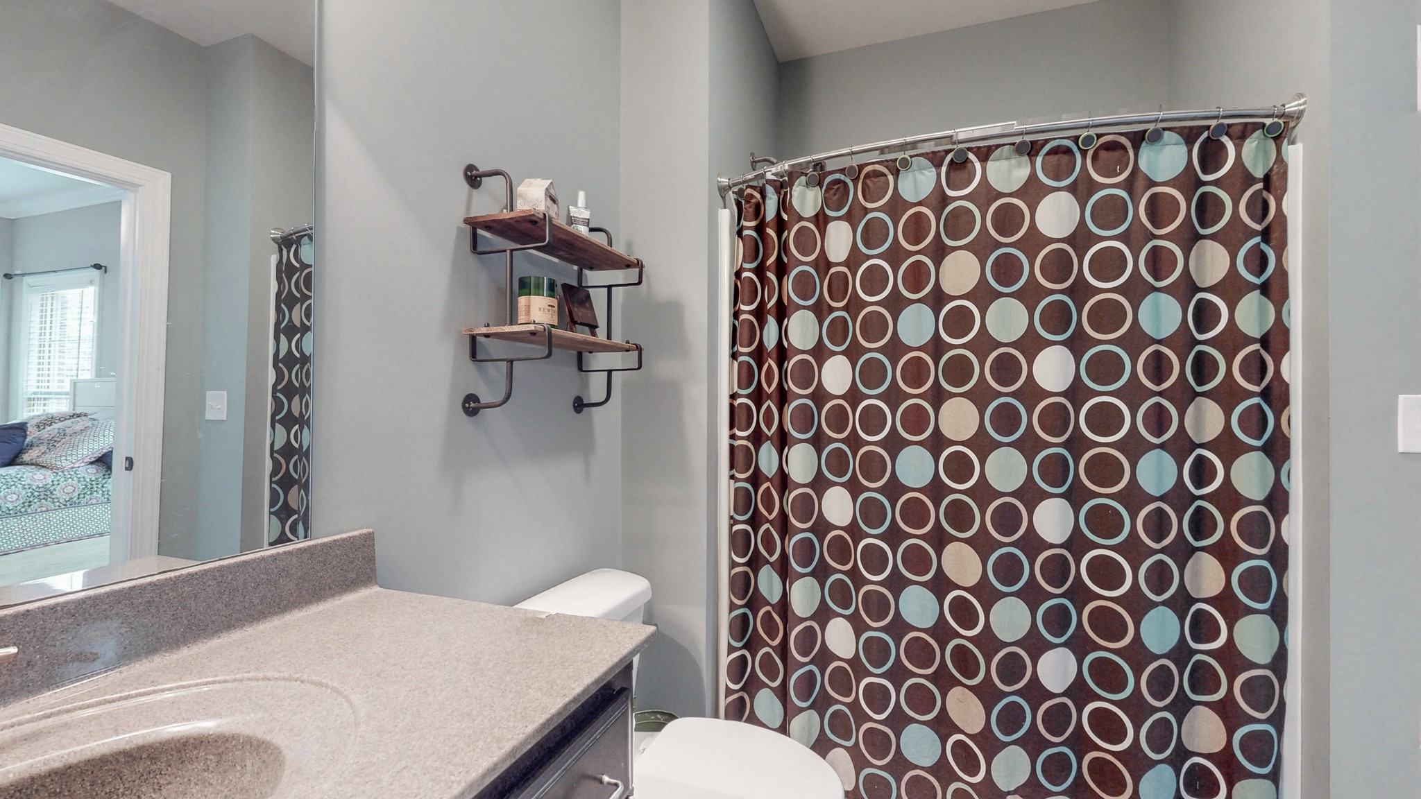 7270 Old Franklin Road Fairview, TN 37062 - Photo 33 of 46 a bathroom with a sink toilet and shower