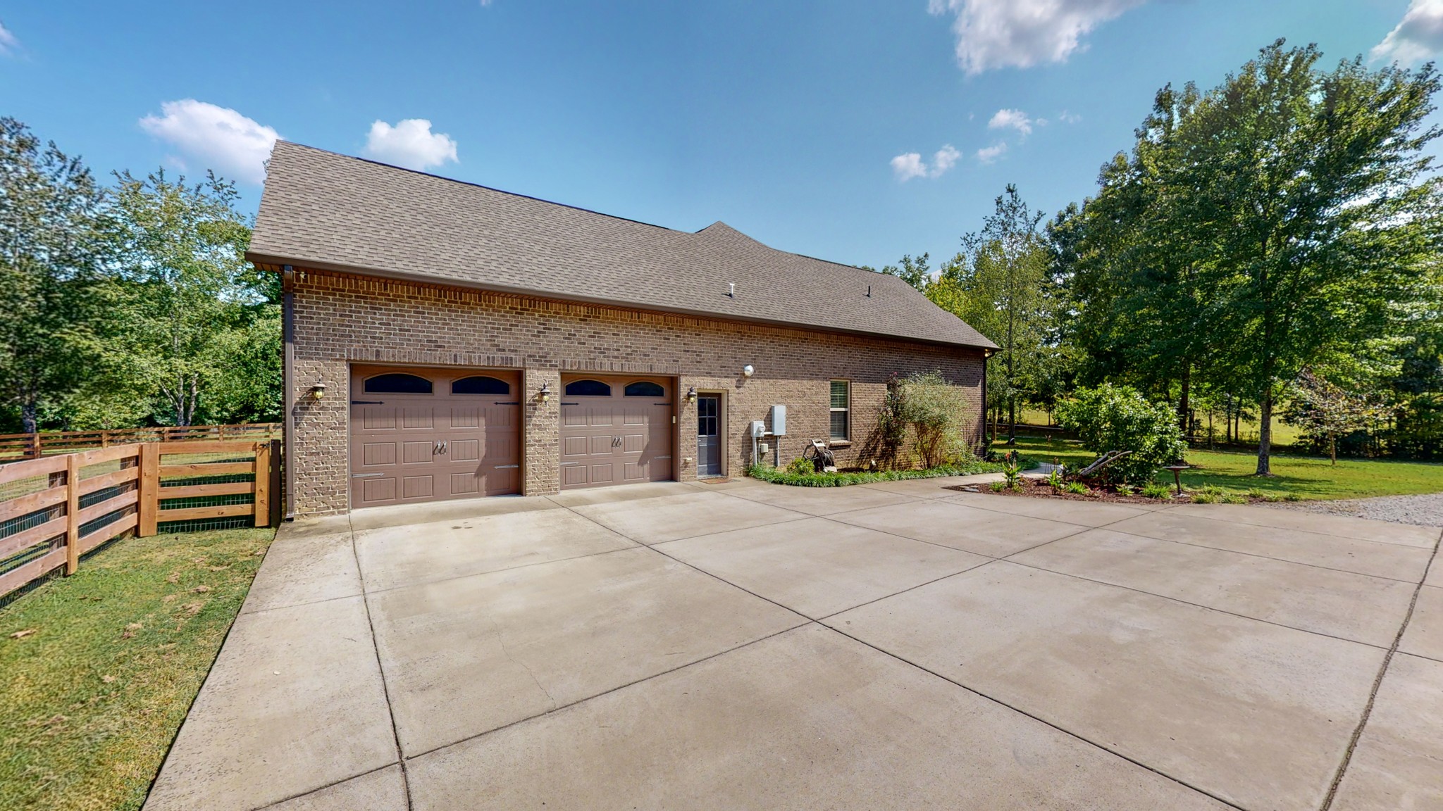 7270 Old Franklin Road Fairview, TN 37062 - Photo 40 of 46 a front view of a house with a yard and garage