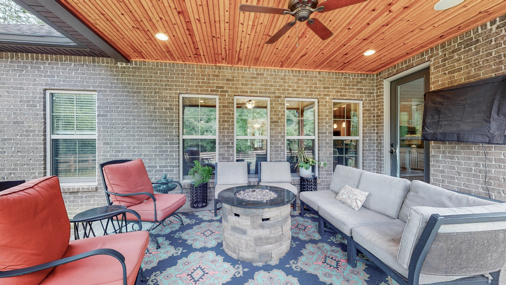 7270 Old Franklin Road Fairview, TN 37062 - Photo 44 of 46 a view of a patio with couches chairs and a potted plant