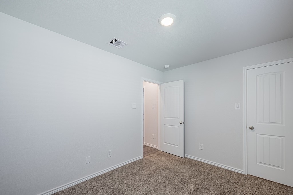 1101 Davy Street Brenham, TX 77833 - Photo 12 of 18 an empty room with an entryway