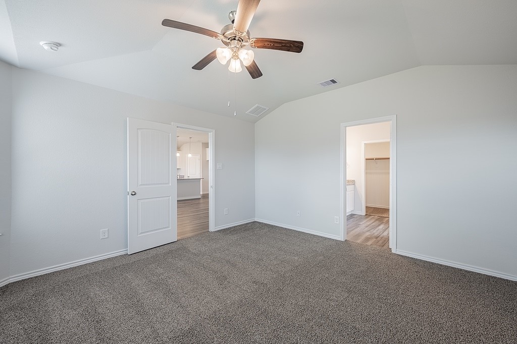 1101 Davy Street Brenham, TX 77833 - Photo 8 of 18 an empty room with chandelier fan