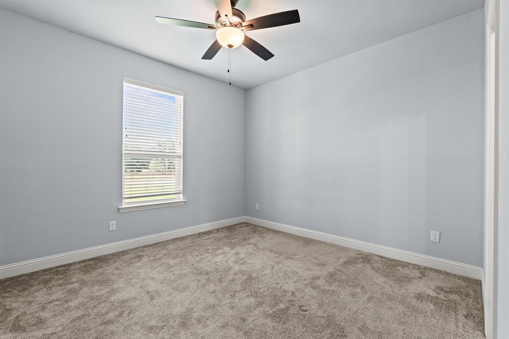 560 Wilson Bend Road Millsap, TX 76066 - Photo 27 of 38 Front, secondary bedroom.