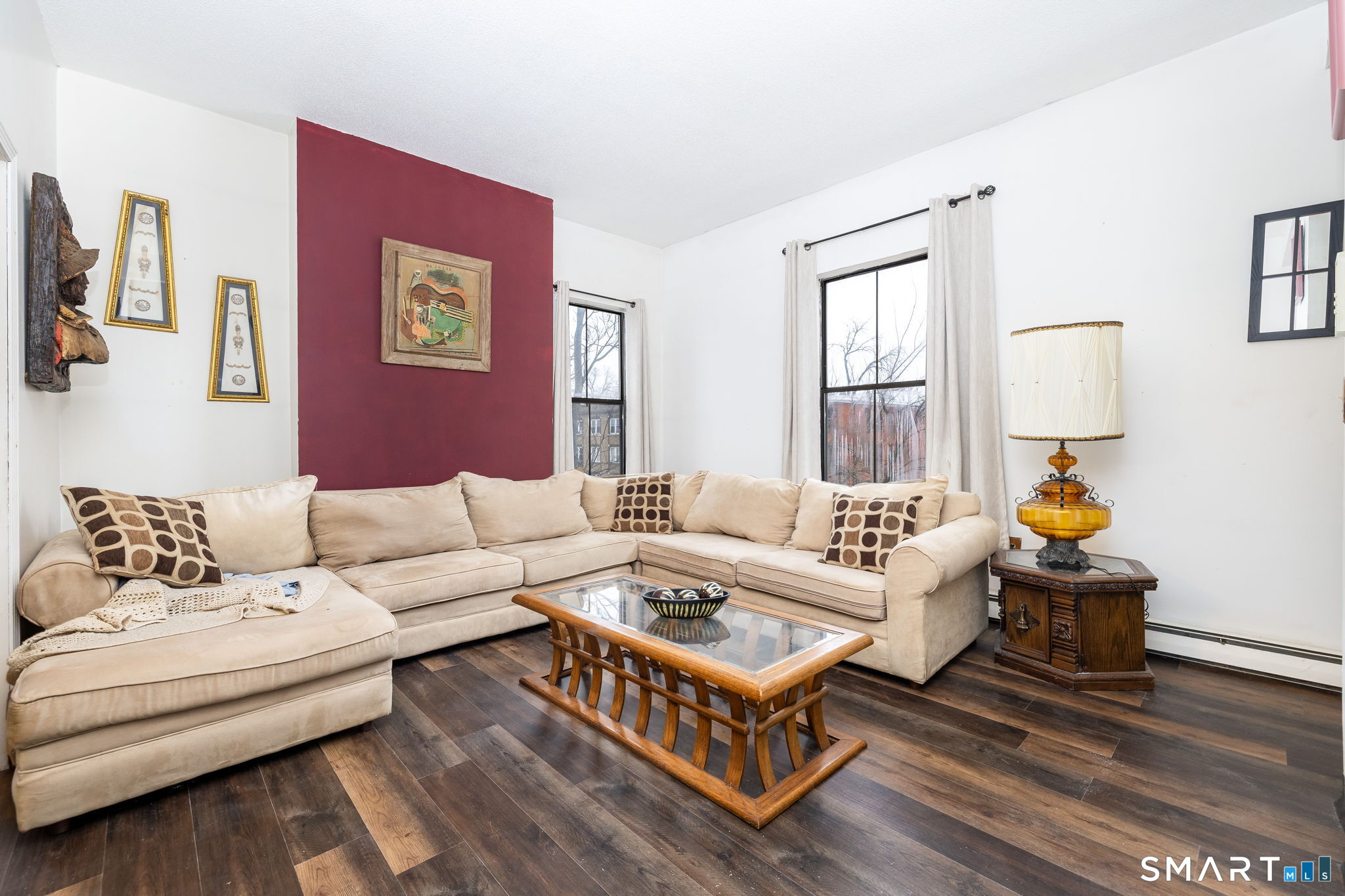36-38 Capen Street, Unit 2B Hartford, CT 06120 - Photo 5 of 25 a living room with furniture a rug and a window