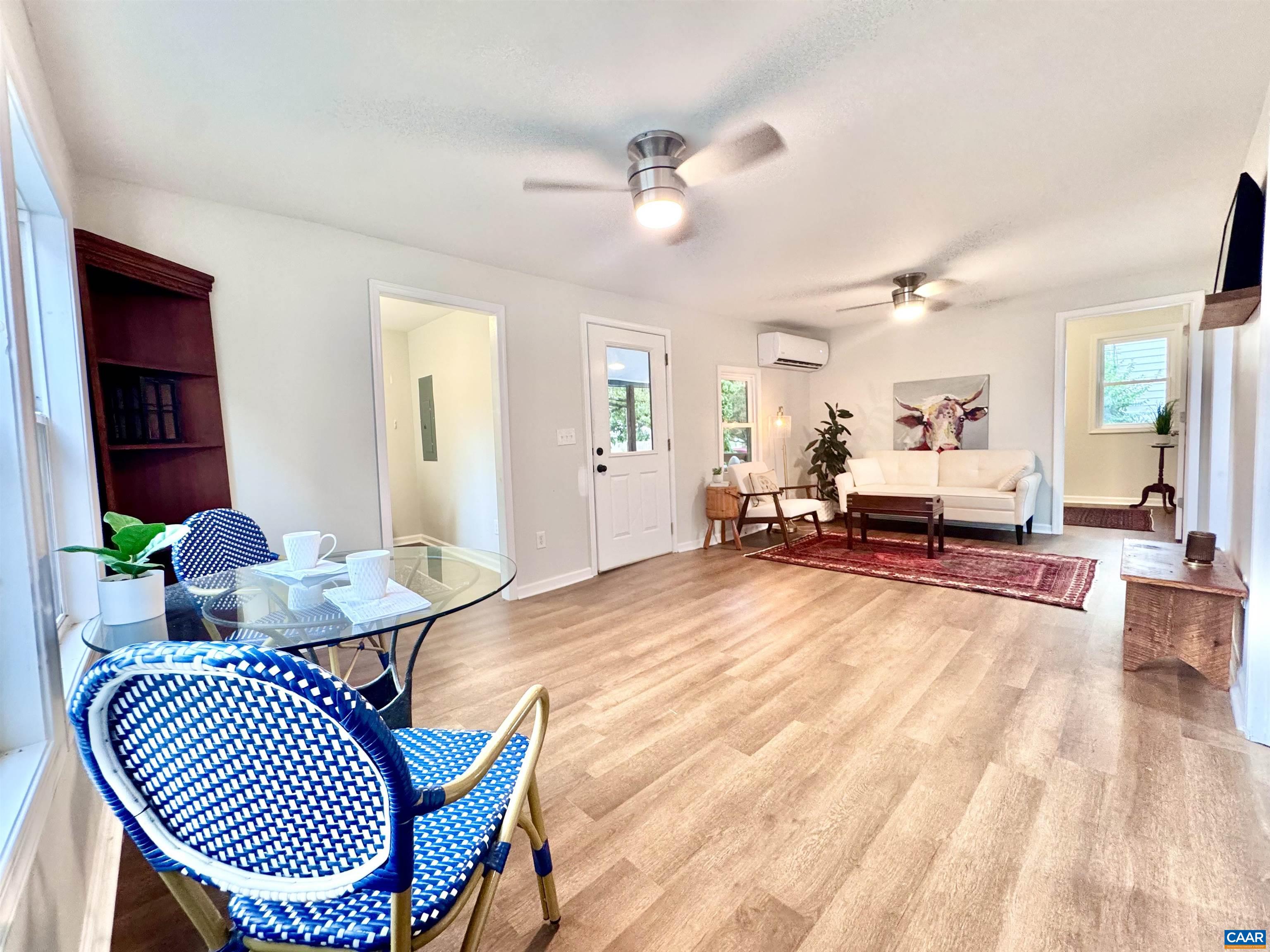 419 Quarry Road Charlottesville, VA 22902 - Photo 4 of 18 a living room with furniture and a table