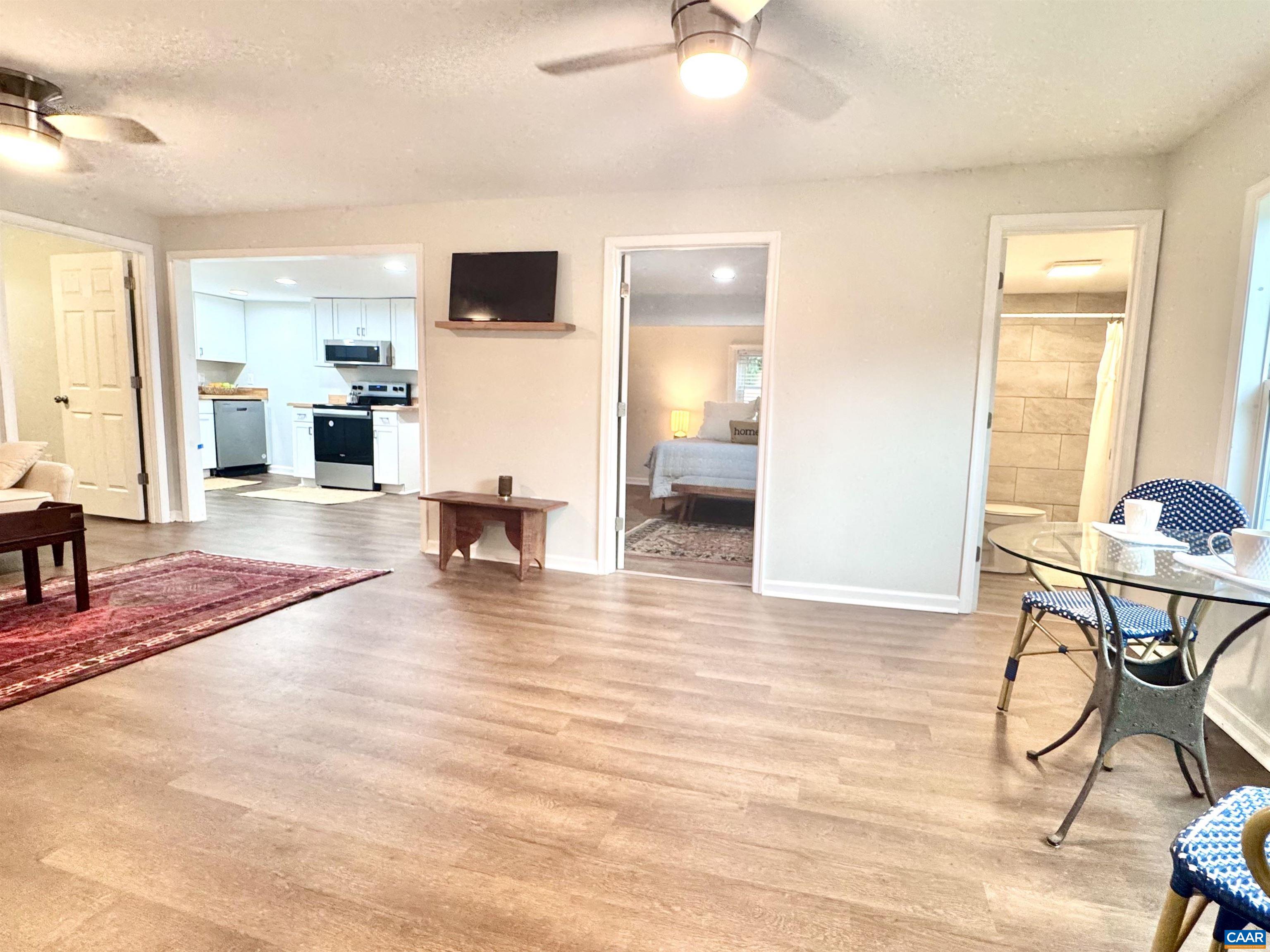 419 Quarry Road Charlottesville, VA 22902 - Photo 5 of 18 a view of a livingroom with furniture and an entryway
