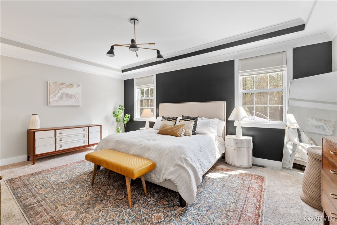 3919 Graythorne Drive Midlothian, VA 23112 - Photo 18 of 41 a spacious bedroom with a bed a flat screen tv and balcony