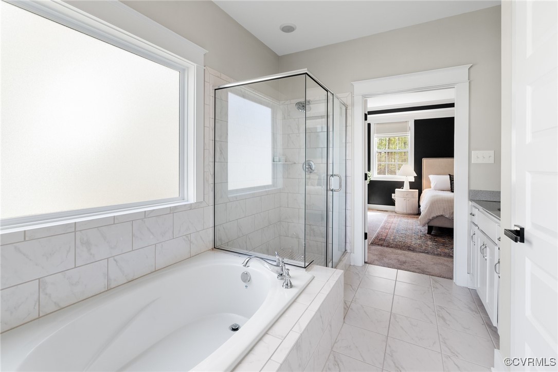 3919 Graythorne Drive Midlothian, VA 23112 - Photo 23 of 41 a spacious bathroom with a tub shower and bedroom