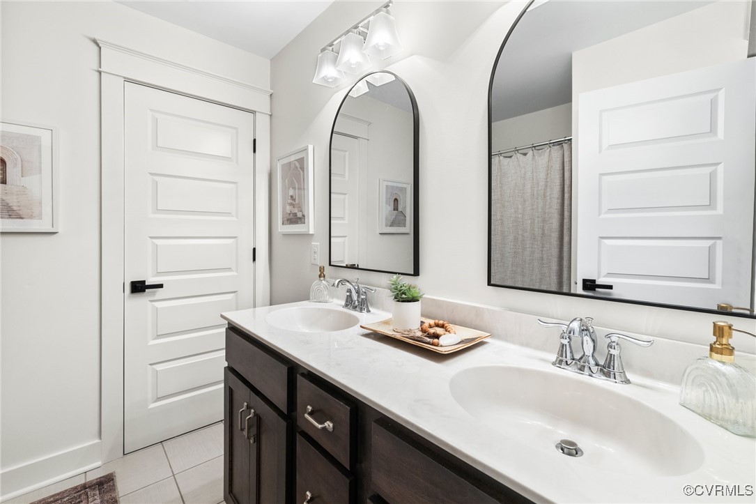3919 Graythorne Drive Midlothian, VA 23112 - Photo 29 of 41 a bathroom with a double vanity sink and a mirror