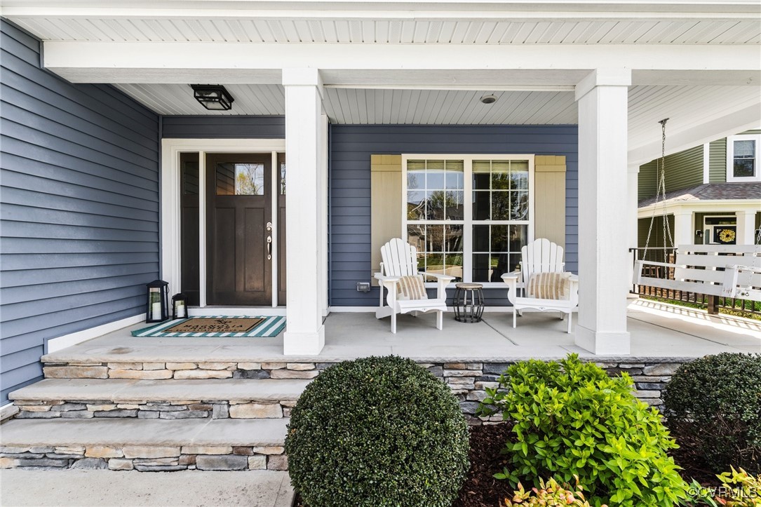 3919 Graythorne Drive Midlothian, VA 23112 - Photo 3 of 41 a front view of a house with outdoor seating