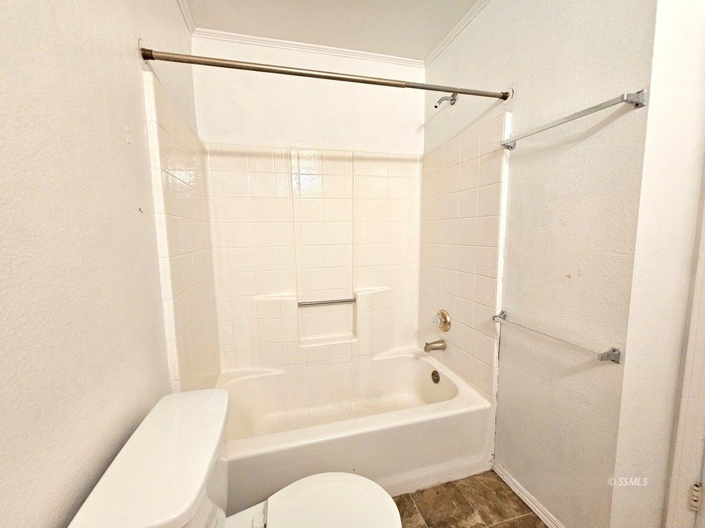 719 Regency Court Ridgecrest, CA 93555 - Photo 29 of 37 a bathroom with a sink toilet and shower