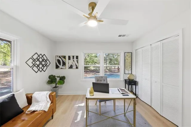 a living room with furniture and a window