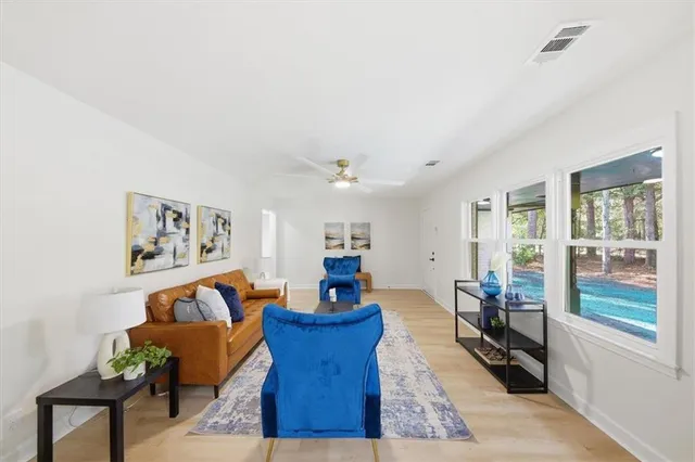 a living room with furniture and a window