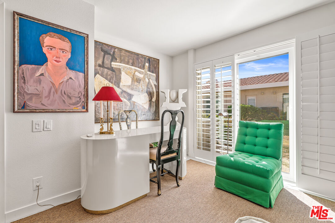 72325 Roxbury Drive Rancho Mirage, CA 92270 - Photo 20 of 66 a living room with furniture and a window
