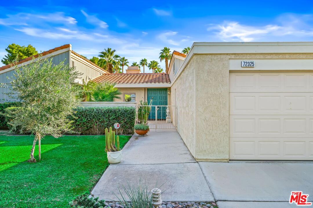 72325 Roxbury Drive Rancho Mirage, CA 92270 - Photo 2 of 66 a view of a house with a yard