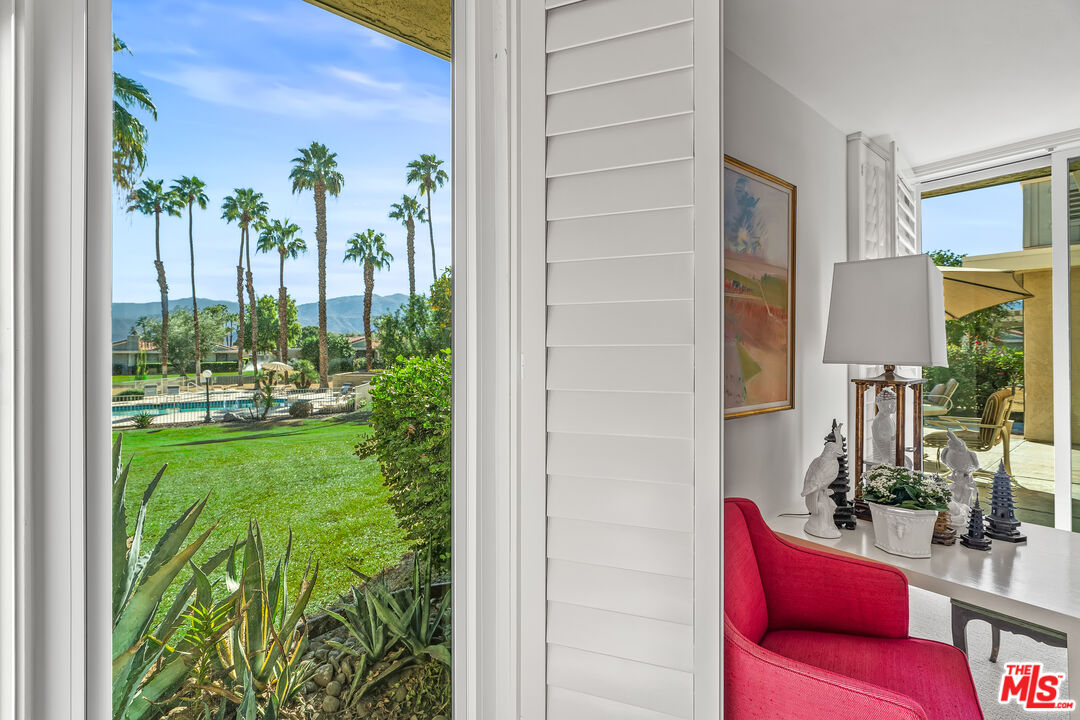 72325 Roxbury Drive Rancho Mirage, CA 92270 - Photo 30 of 66 a view of living room filled with furniture and garden view
